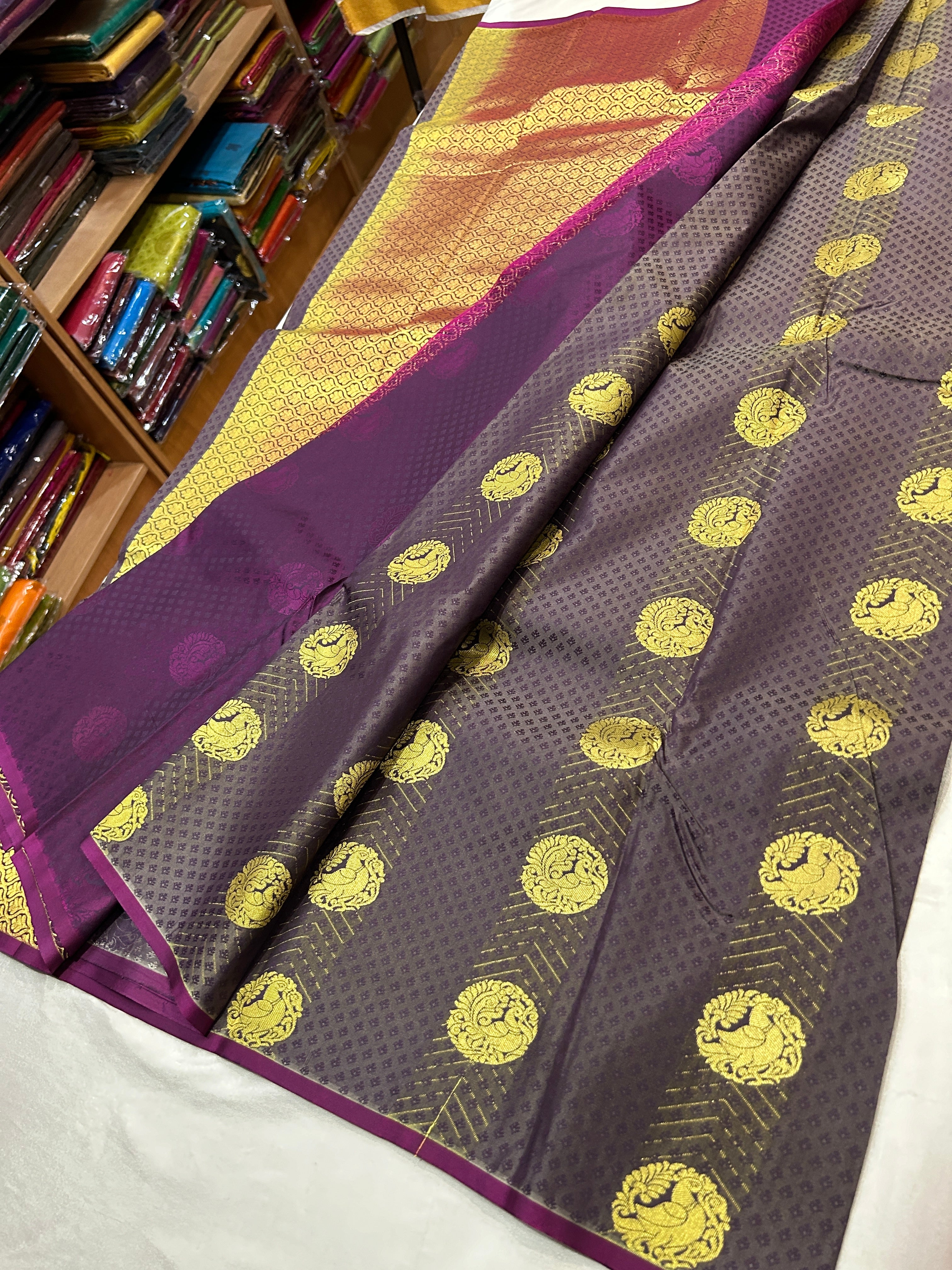 Kanchi semi silk saree with contrast plain blouse and rich pallu