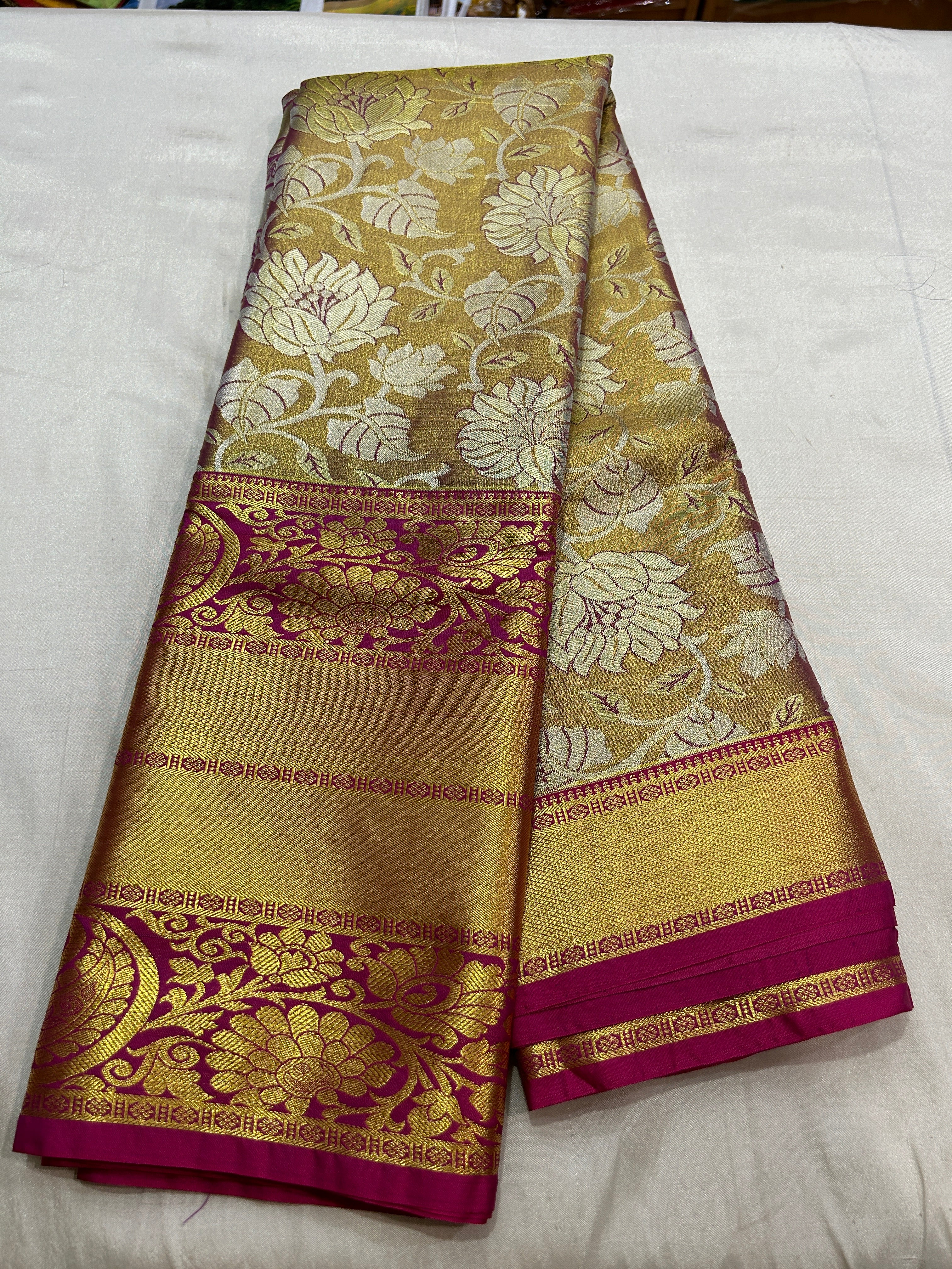 Tissue Kanchipuram  semisilk  saree with contrast blouse and rich pallu