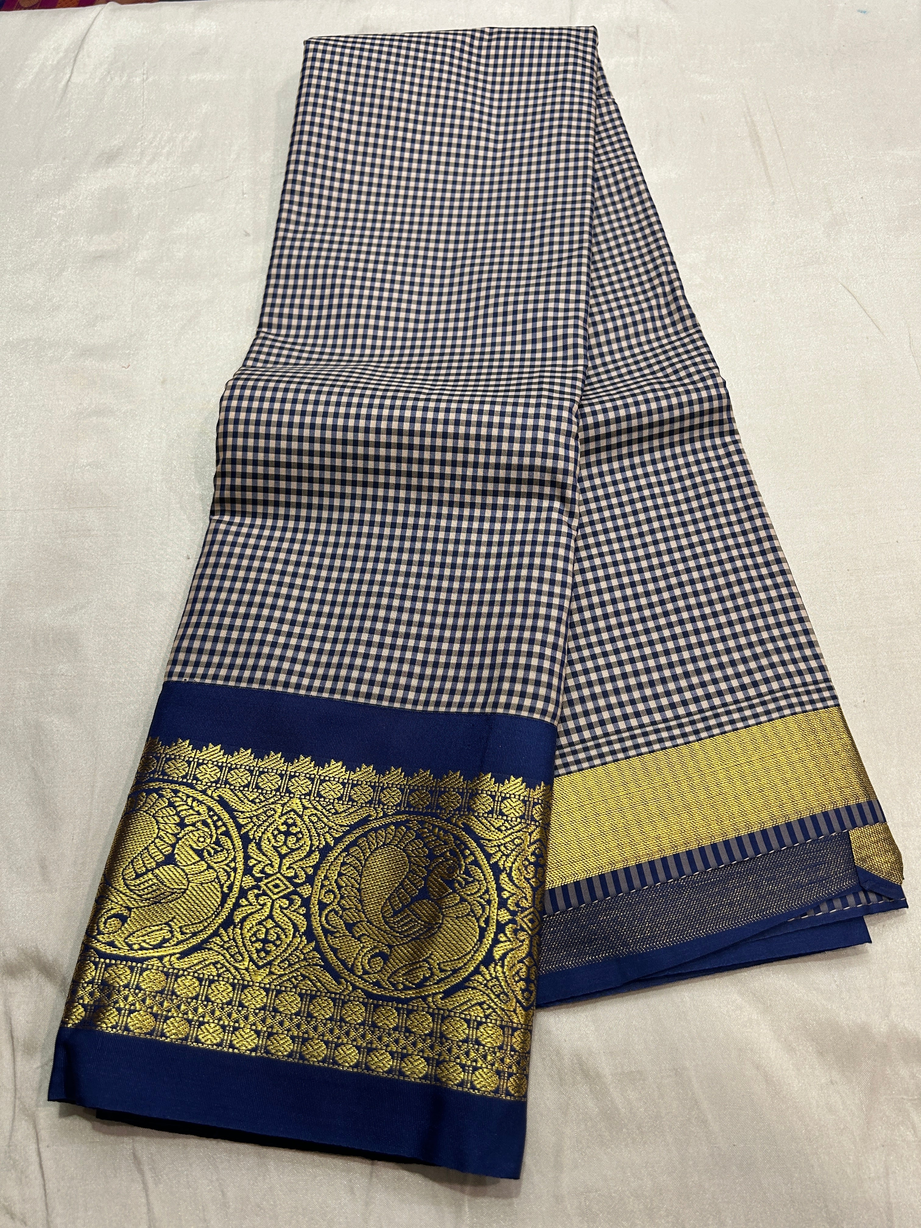 Korvai checked soft semisilk  saree with contrast blouse and rich pallu