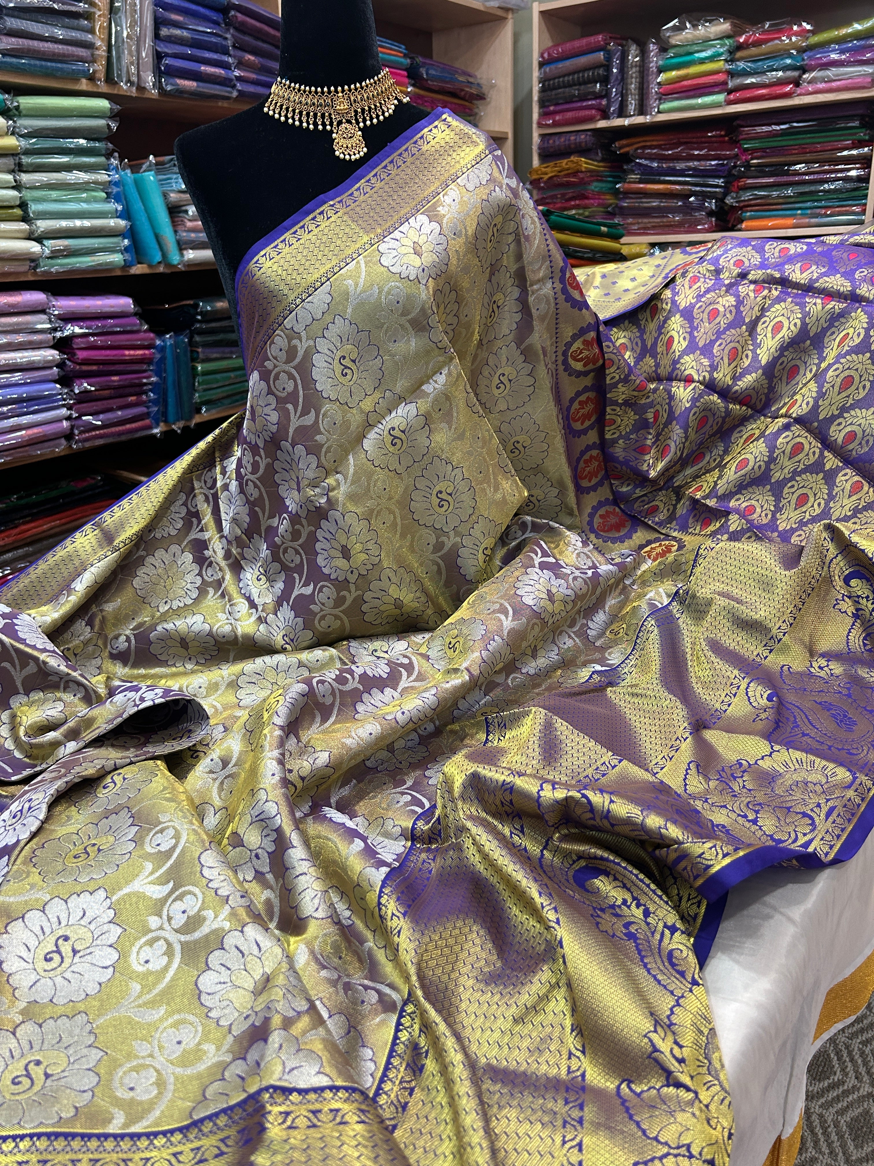 Kanchi Tissue semi silk saree with contrast blouse and rich pallu