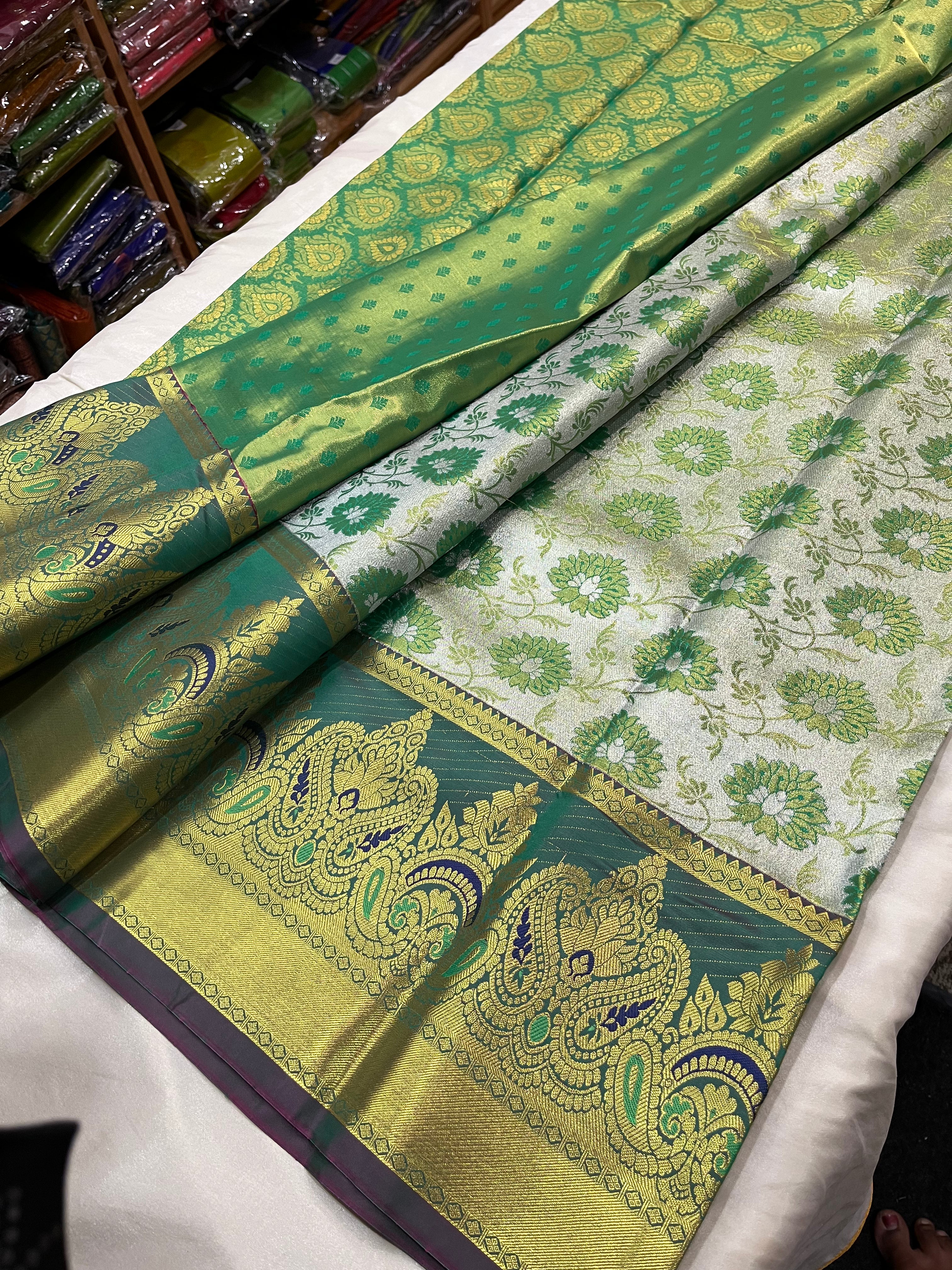 kanchi Rich Tissue Semi silk saree  with contrast blouse and rich jari pallu