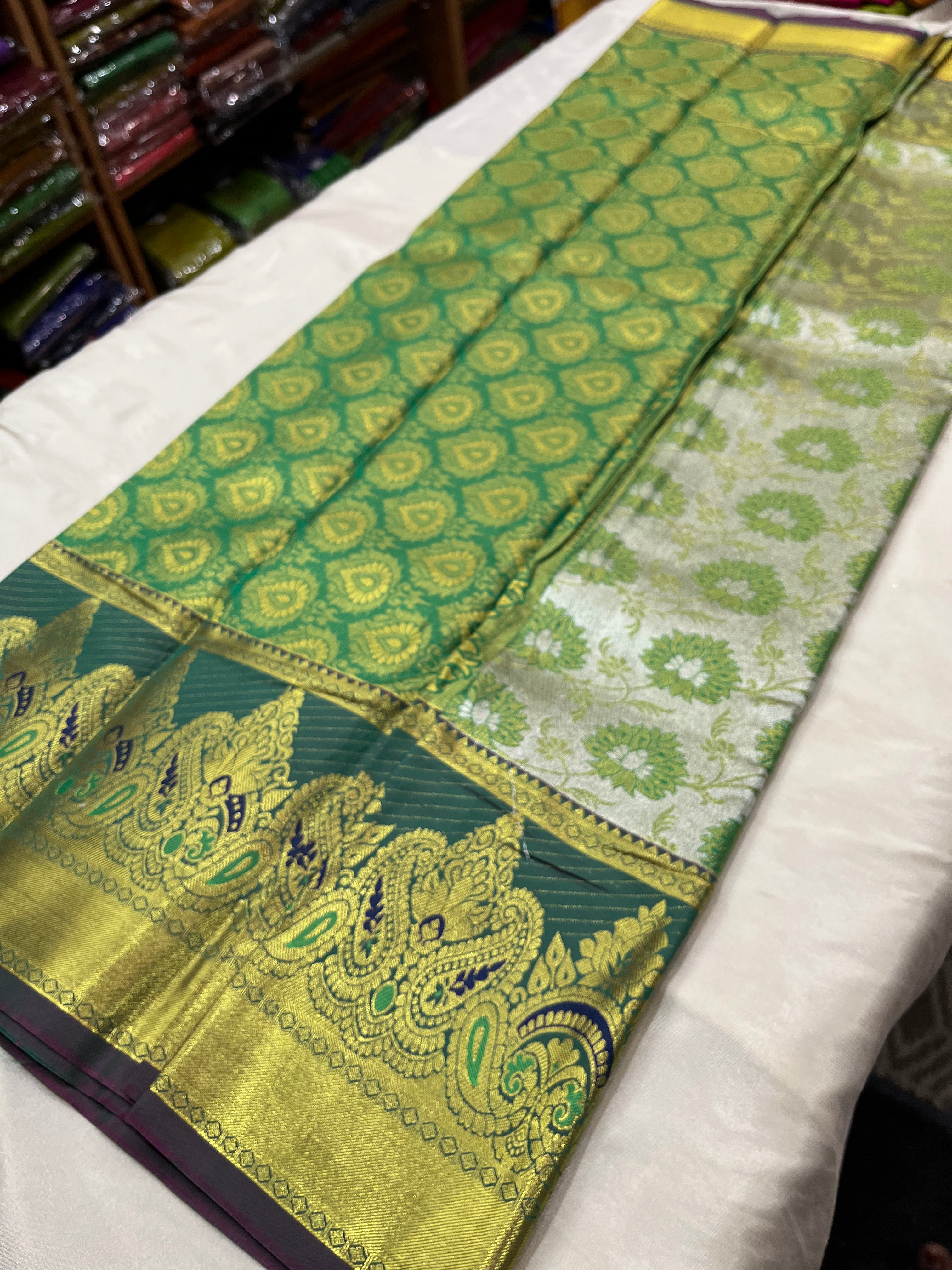 kanchi Rich Tissue Semi silk saree  with contrast blouse and rich jari pallu