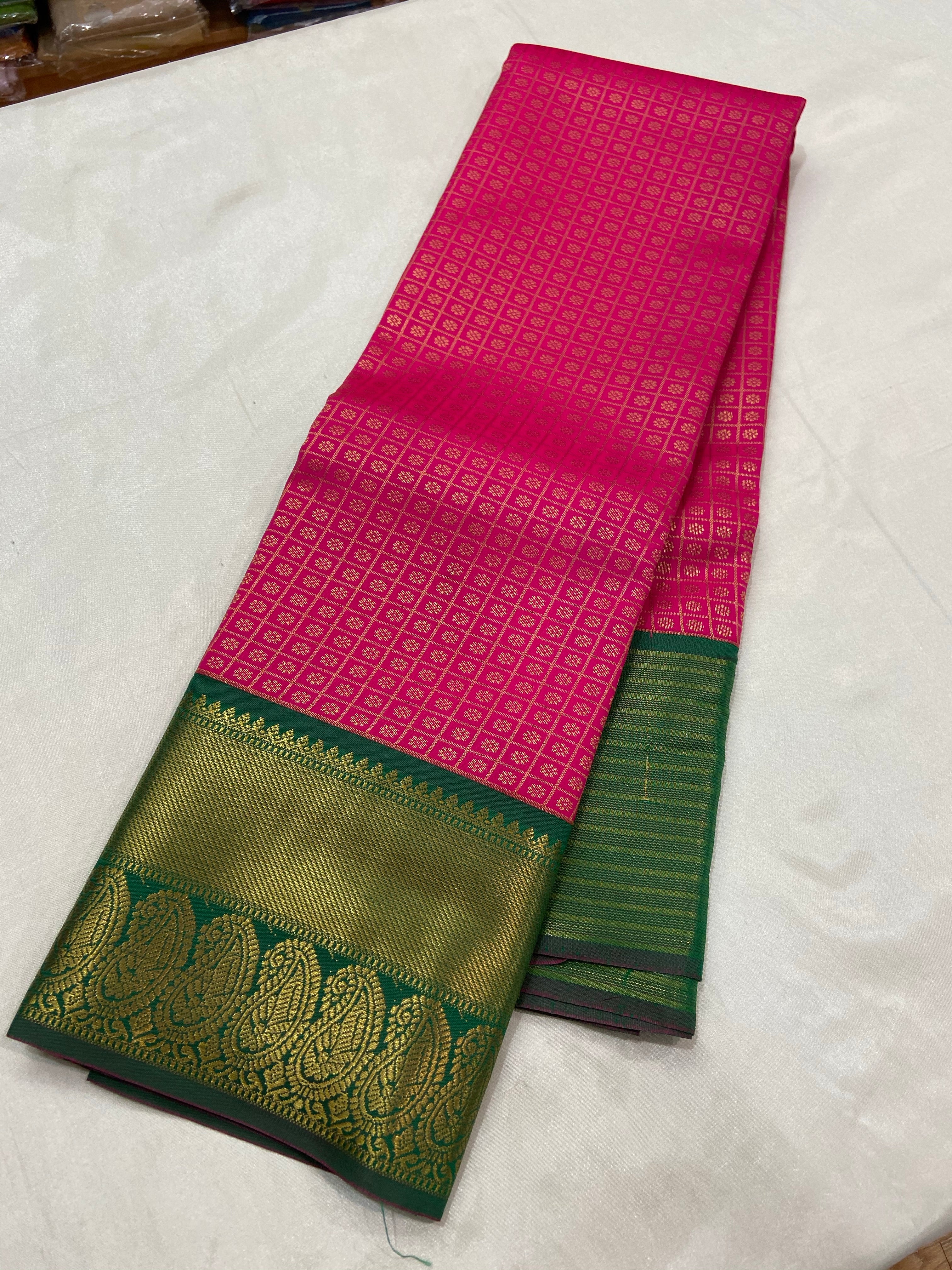 Kanchipuramkanchipuram Semi silk saree  with contrast blouse and rich jari pallu